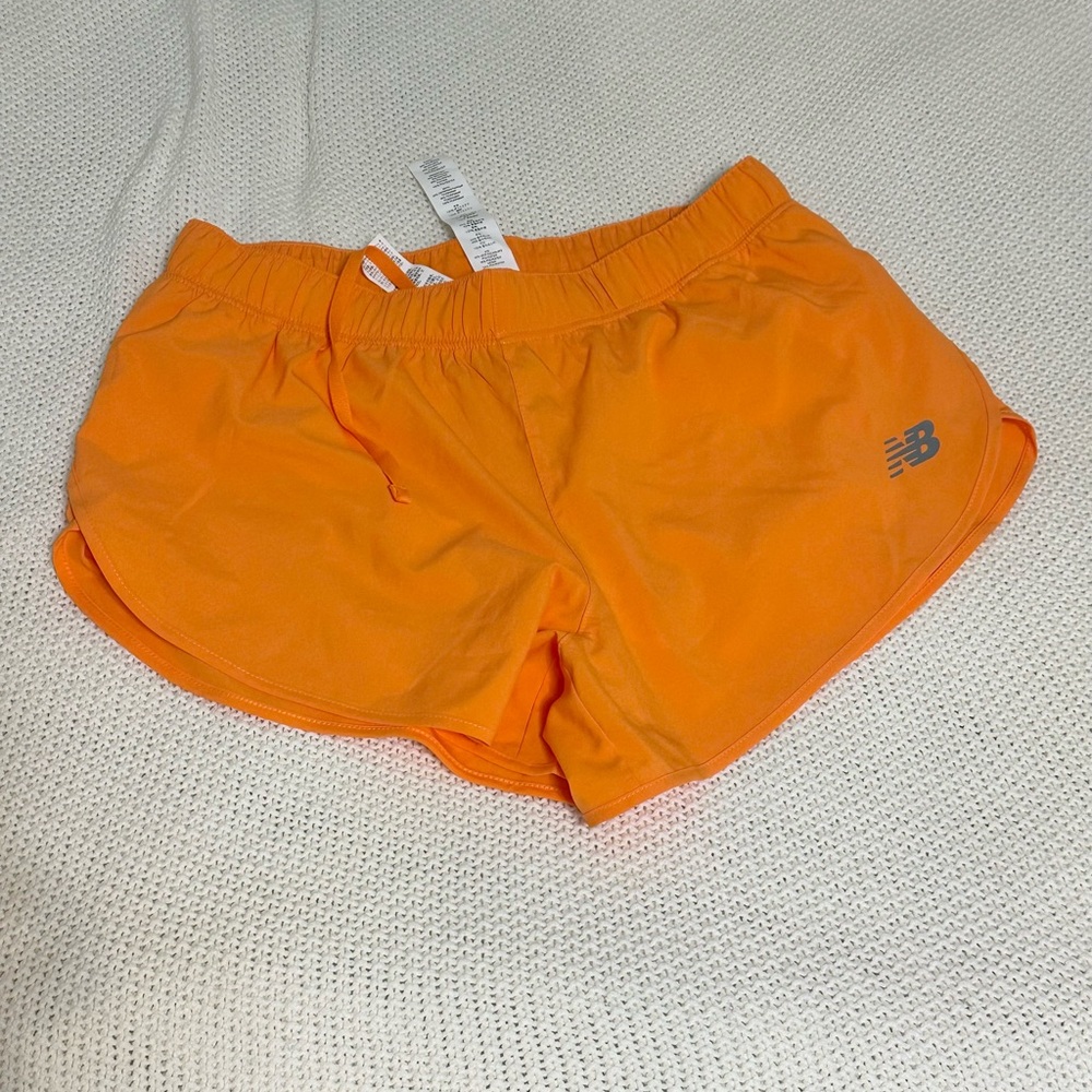 New balance orange lined shorts